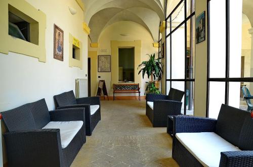 Ruang duduk di Ostello Palazzo Pierantoni