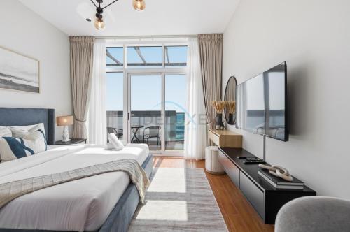 High-Floor Studio, Walking Distance to the Park and 15-Min Drive to Miracle Garden, Al Jawhara Tower, Jumeirah Village Triangle by Deluxe Holiday Homes