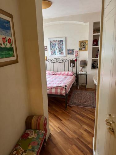 a bedroom with a bed in a room at All'ingresso delle antiche mura della città in San Marino