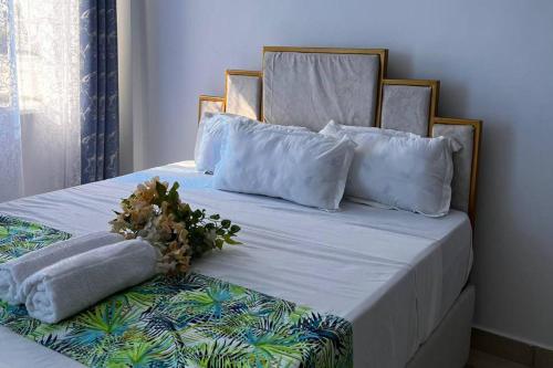 Postel nebo postele na pokoji v ubytování Stunning 2 Bedroom Apartment in Mombassa