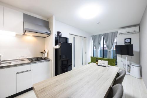 Kuchyň nebo kuchyňský kout v ubytování Villetta Imari Ekimae III Room 102 - Vacation STAY 19027