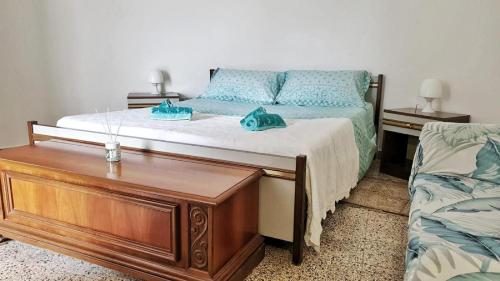 Ένα ή περισσότερα κρεβάτια σε δωμάτιο στο Trullallegro