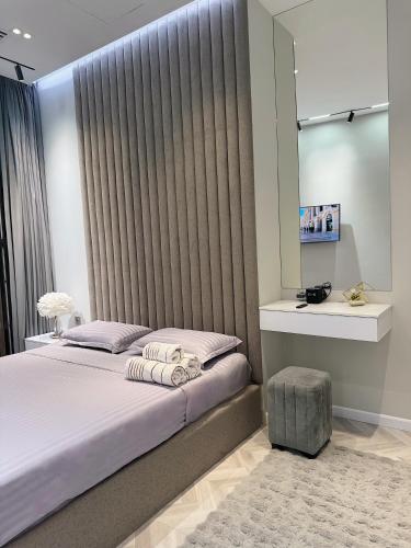 Ένα ή περισσότερα κρεβάτια σε δωμάτιο στο Cozy Nest Apartments