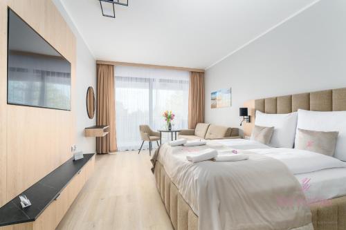 Ένα ή περισσότερα κρεβάτια σε δωμάτιο στο Your Holidays Infinity A233