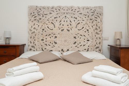 Postel nebo postele na pokoji v ubytování Cormorani appartamento N 5