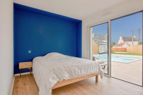 Ένα ή περισσότερα κρεβάτια σε δωμάτιο στο Villa pour 9 - Piscine chauffée - Jacuzzi