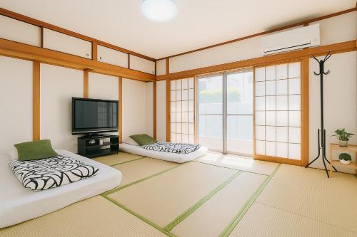 Nippori Osaka Nishi-Tengachaya Guesthouse西天下茶屋アパートメント