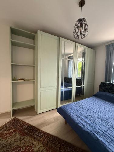 Ένα ή περισσότερα κρεβάτια σε δωμάτιο στο Comfortable and central short-term