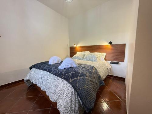 Ένα ή περισσότερα κρεβάτια σε δωμάτιο στο WildValley Guesthouse