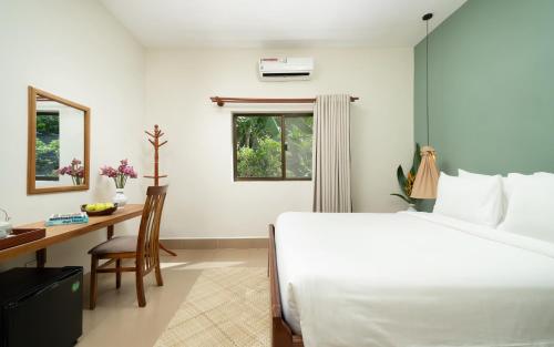 Postel nebo postele na pokoji v ubytování The Tree - Adults only