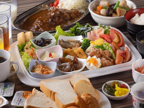 a tray of food with different types of food on a table at APA Hotel Hakata Ekimae 4 chome in Fukuoka