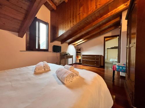 Postel nebo postele na pokoji v ubytování Kibilù - Via Generale Chinotto