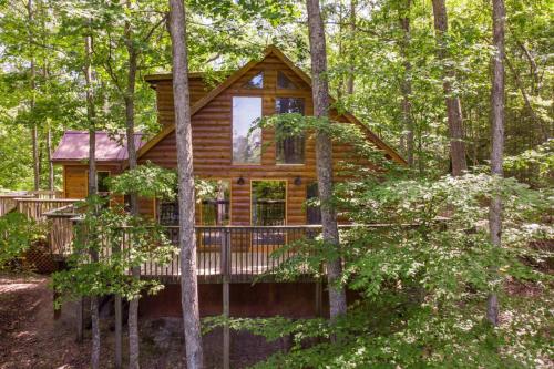 a log cabin in the woods with trees at Gorgeous View Cabin - in Red River Gorge KY in Slade