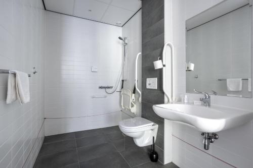 Koupelna v ubytování Hotel Hulsman