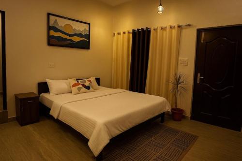 Postel nebo postele na pokoji v ubytování Vin's Villa & caffe