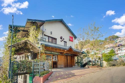 a building on the side of a street at Kasauli Residency in Kasauli