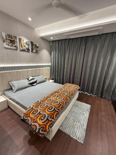 Postel nebo postele na pokoji v ubytování Homely Heaven