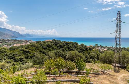 a view of the ocean from a hill at Le Voyageur Cilento in Vibonati
