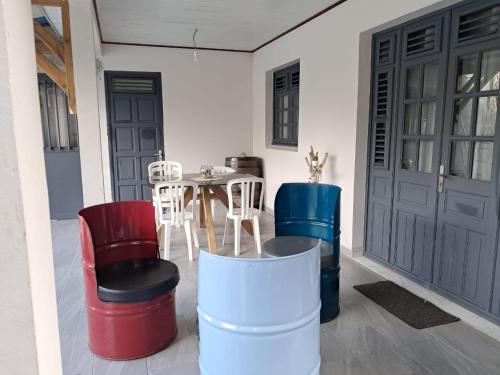 Posezení v ubytování La villa aux 4 palmiers