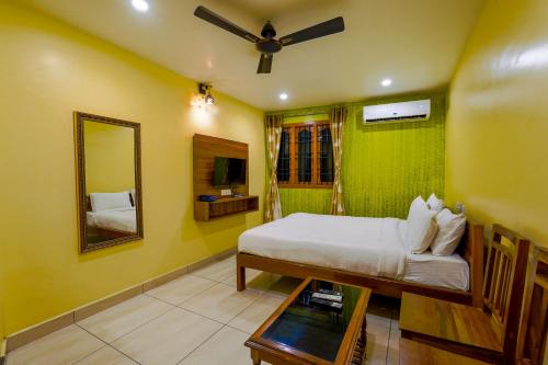 Postel nebo postele na pokoji v ubytování White yellow residency