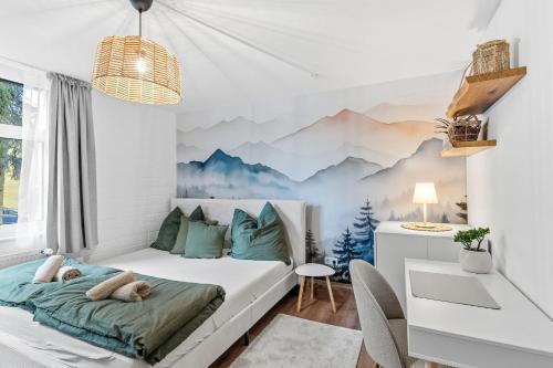 Ένα ή περισσότερα κρεβάτια σε δωμάτιο στο Ferienwohnung Wipfelglück mit Pool und Sauna