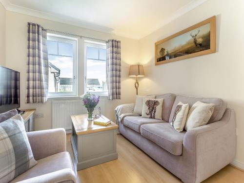 Khu vực ghế ngồi tại Kincraig Apartment