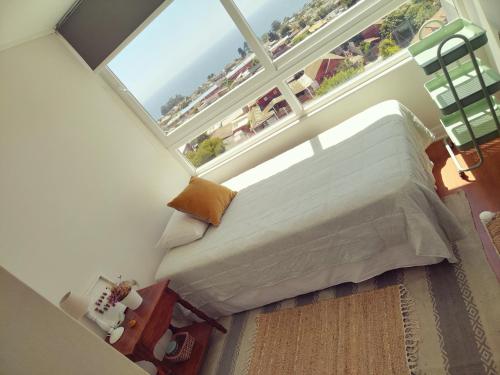 康康Despierta con vista al mar en un hogar tranquilo y luminoso的相册照片