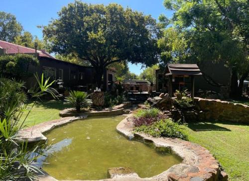 Ein Garten an der Unterkunft Sunset Sunrise Country Farm