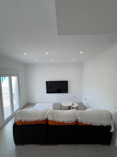 Postel nebo postele na pokoji v ubytování Pitas del Cabo