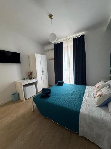 Postel nebo postele na pokoji v ubytování Coral B&B