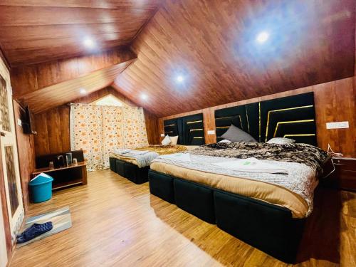 Postel nebo postele na pokoji v ubytování Evergreenheights