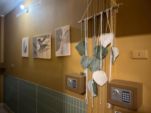 a bathroom with towels hanging on a wall at NOOK INN Hidden Gem Old Quarter in Hanoi