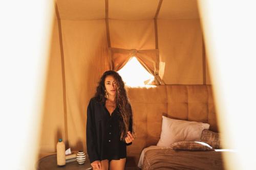 Ένα ή περισσότερα κρεβάτια σε δωμάτιο στο Merzouga Amanda Luxury Desert