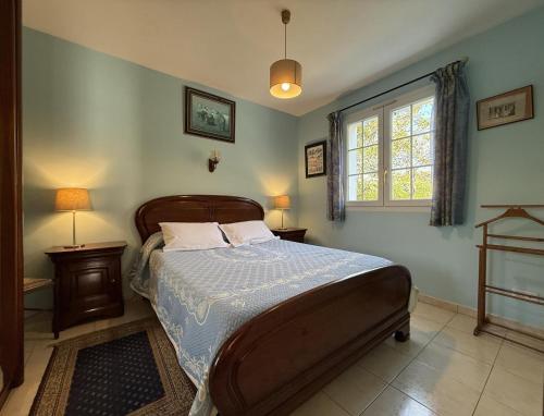 Ένα ή περισσότερα κρεβάτια σε δωμάτιο στο Chez begue