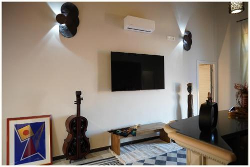 Μια τηλεόραση ή/και κέντρο ψυχαγωγίας στο Hotel Villa Nunziante Pompei