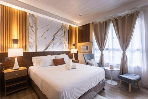 The Fifth By Belabeu - a stylish one-bedroom unit at Mesavirre Garden Residence