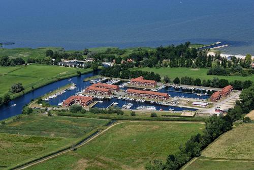 an aerial view of a marina with boats in the water at Ferienwohnung 212 Lagunenstadt in Ueckermünde