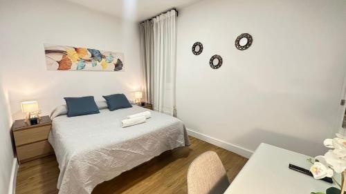 En eller flere senge i et værelse på Habitaciones Manuela