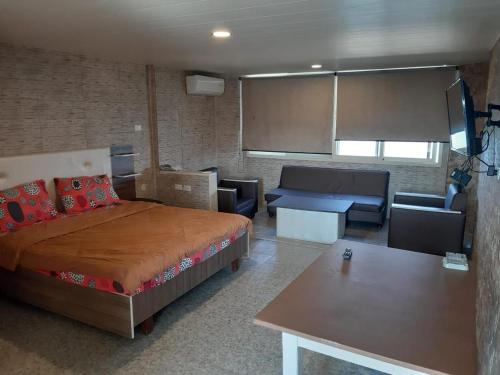 Χώρος καθιστικού στο Mounes Hotel