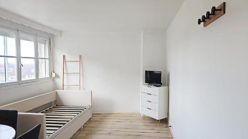 TV a/nebo společenská místnost v ubytování Plein cœur du Portel, Cosy à 5 min à pied de la plage