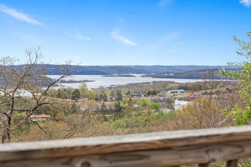 a view of a body of water from a balcony at The Greenview Manor with Lake Views in Kimberling City