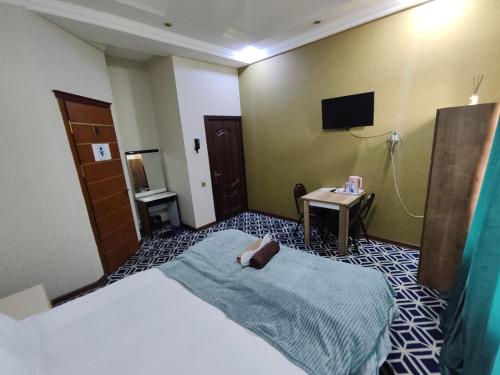 Turan EMK Hotelにあるベッド