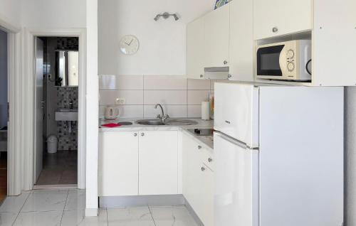 Amazing Apartment In Podgora With House Sea View