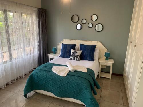 Ένα ή περισσότερα κρεβάτια σε δωμάτιο στο Zestees bed and breakfast