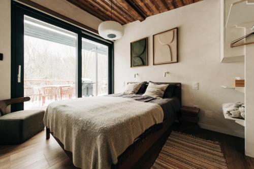 Postel nebo postele na pokoji v ubytování ZAMA Forest Resort