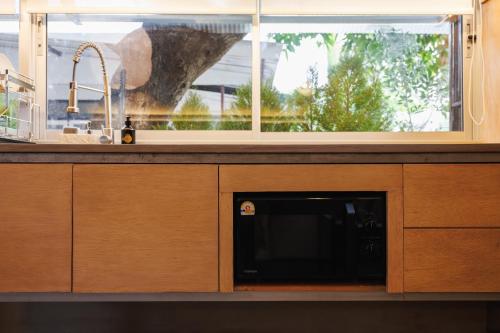 Nhà bếp/bếp nhỏ tại Suknirun House