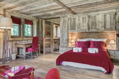 Una cama o camas en una habitación de Chalet Javen - 520m2 avec piscine chauffée et home cinéma
