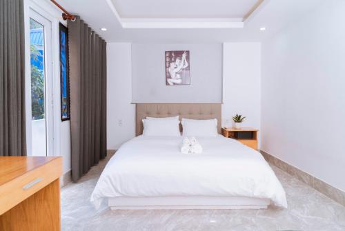 Ένα ή περισσότερα κρεβάτια σε δωμάτιο στο The July - Coliving by Kegotel