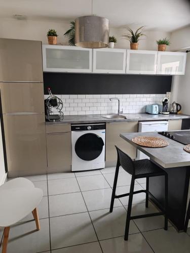 Η κουζίνα ή μικρή κουζίνα στο Le repos du voyageur