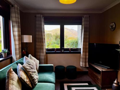 Televiisor ja/või meelelahutuskeskus majutusasutuses The Cottage at Craigavon House